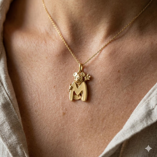COLGANTE ORO 18 KTES CON LA LETRA "M"